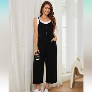 Women’s medium inspired jumper black with adjustable waist front pockets black